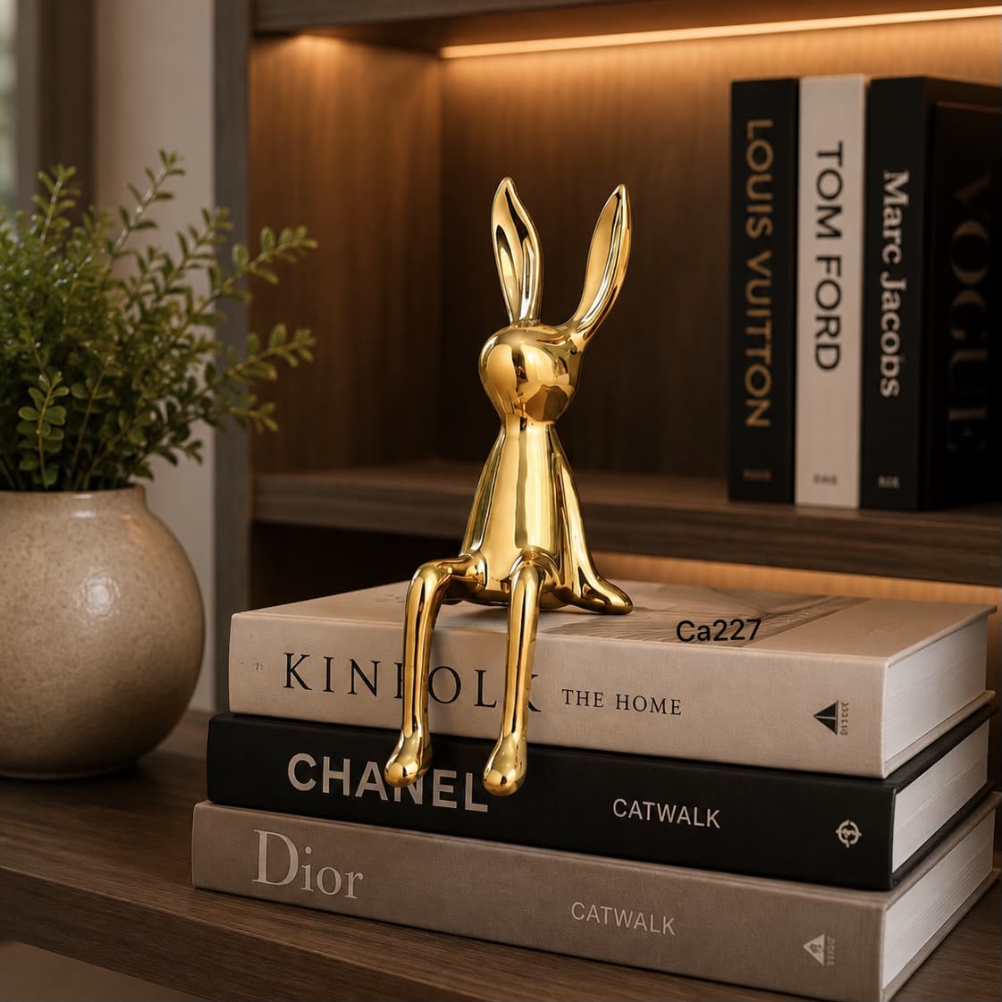 Articulo decorativo conejo dorado pequeño 8cm* 10cm* 21cm